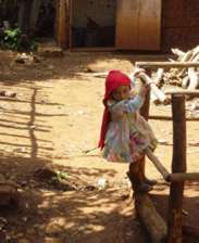 Girl in yard. Western Ethiopia. Photographer: James Li, M.D.