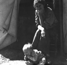 Eighteen year-old mother from Oklahoma, now a California migrant, during Great Depression, 1937. Library of Congress: LC-USF34- 016269-C. Photographer: Dorothea Lange.